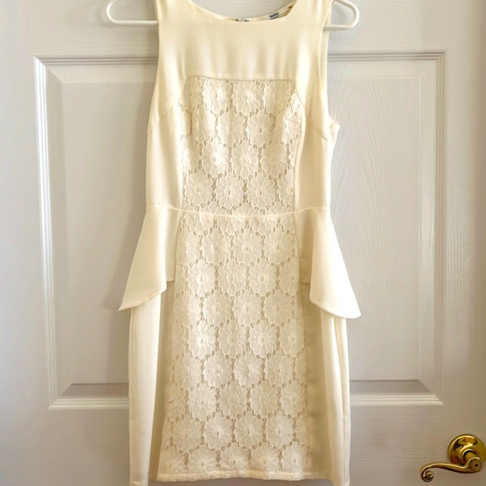 Dress with peplum